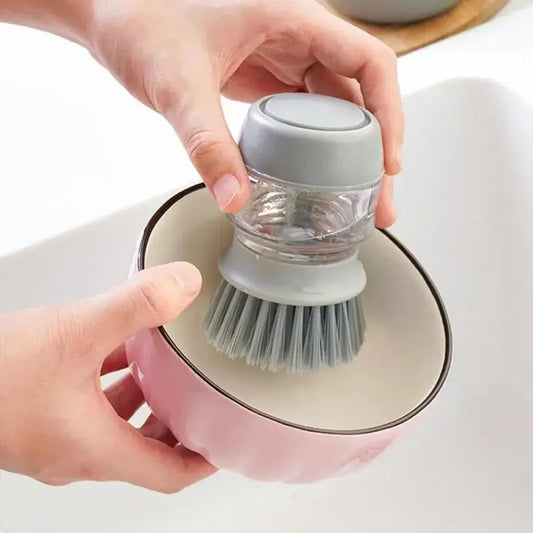Brosse de nettoyage avec distributeur de savon intégrer